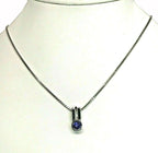 14kt white gold Tanzanite and Diamond Pendant & Chain