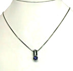14kt white gold Tanzanite and Diamond Pendant & Chain