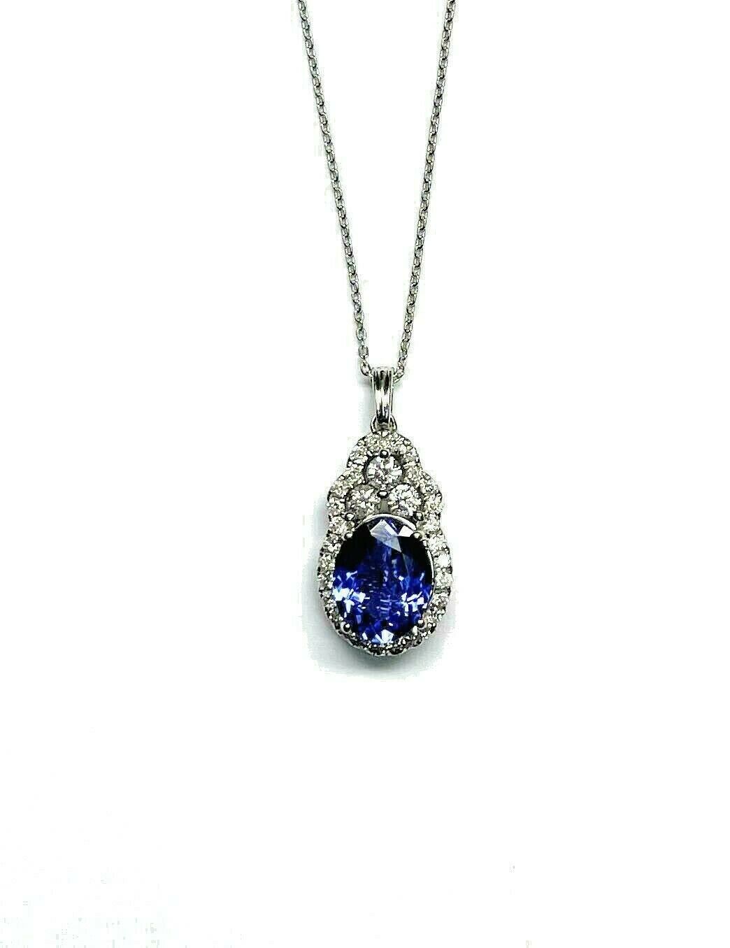 Kallati 14KT White Gold Oval 1.70ct Tanzanite and 0.57ctw Diamond Halo Pendant