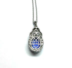 Kallati 14KT White Gold Oval 1.70ct Tanzanite and 0.57ctw Diamond Halo Pendant