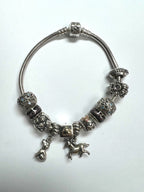 Pandora Sterling Silver bracelet with 11 charms 7.5"