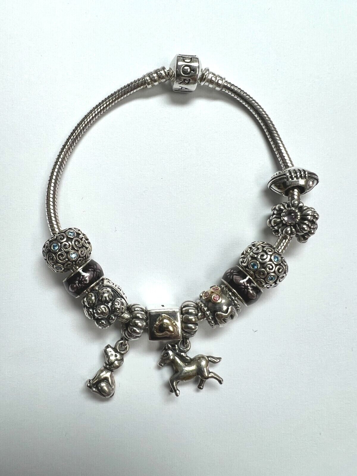 Pandora Sterling Silver bracelet with 11 charms 7.5"