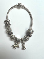 Pandora Sterling Silver bracelet with 11 charms 7.5"