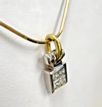 14kt Yellow Gold Chain with a 0.60ctw Diamond and 18kt White Gold Pendant