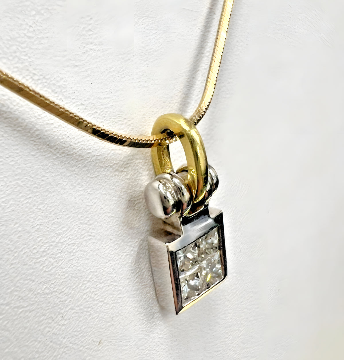 14kt Yellow Gold Chain with a 0.60ctw Diamond and 18kt White Gold Pendant