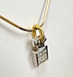 14kt Yellow Gold Chain with a 0.60ctw Diamond and 18kt White Gold Pendant