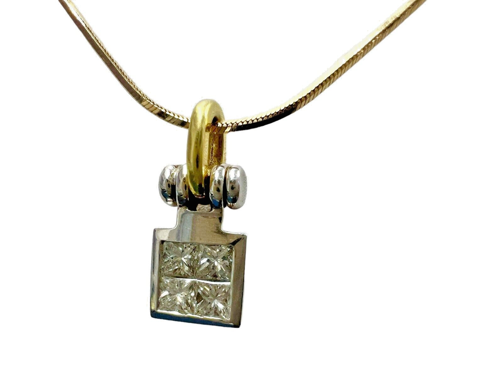 14kt Yellow Gold Chain with a 0.60ctw Diamond and 18kt White Gold Pendant