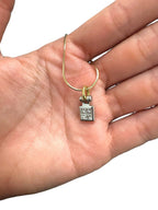 14kt Yellow Gold Chain with a 0.60ctw Diamond and 18kt White Gold Pendant