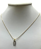 14kt Yellow Gold Chain with a 0.60ctw Diamond and 18kt White Gold Pendant