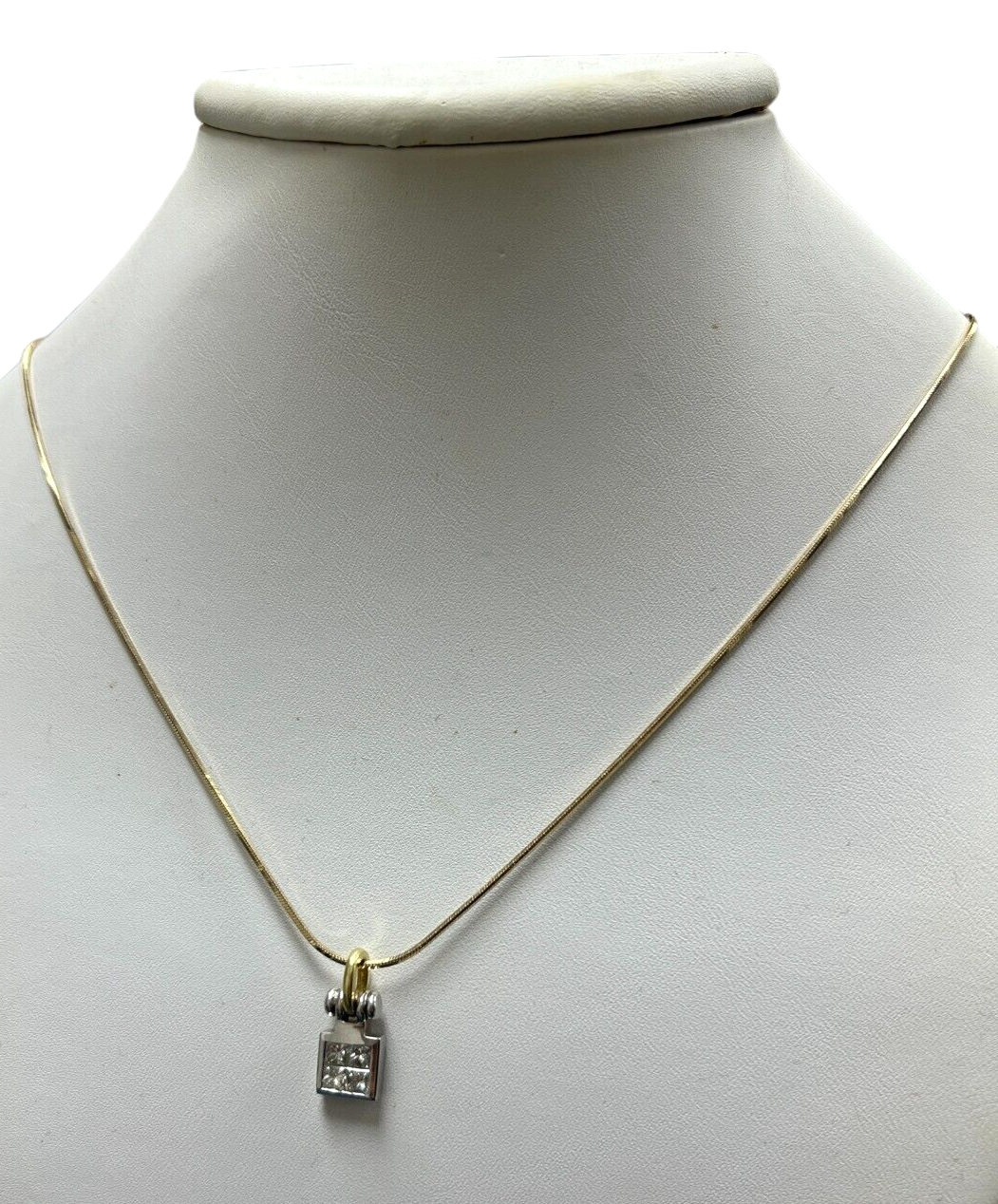14kt Yellow Gold Chain with a 0.60ctw Diamond and 18kt White Gold Pendant