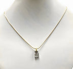 14kt Yellow Gold Chain with a 0.60ctw Diamond and 18kt White Gold Pendant