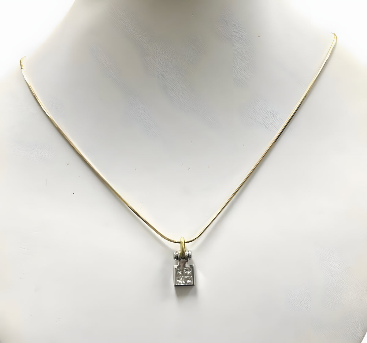 14kt Yellow Gold Chain with a 0.60ctw Diamond and 18kt White Gold Pendant