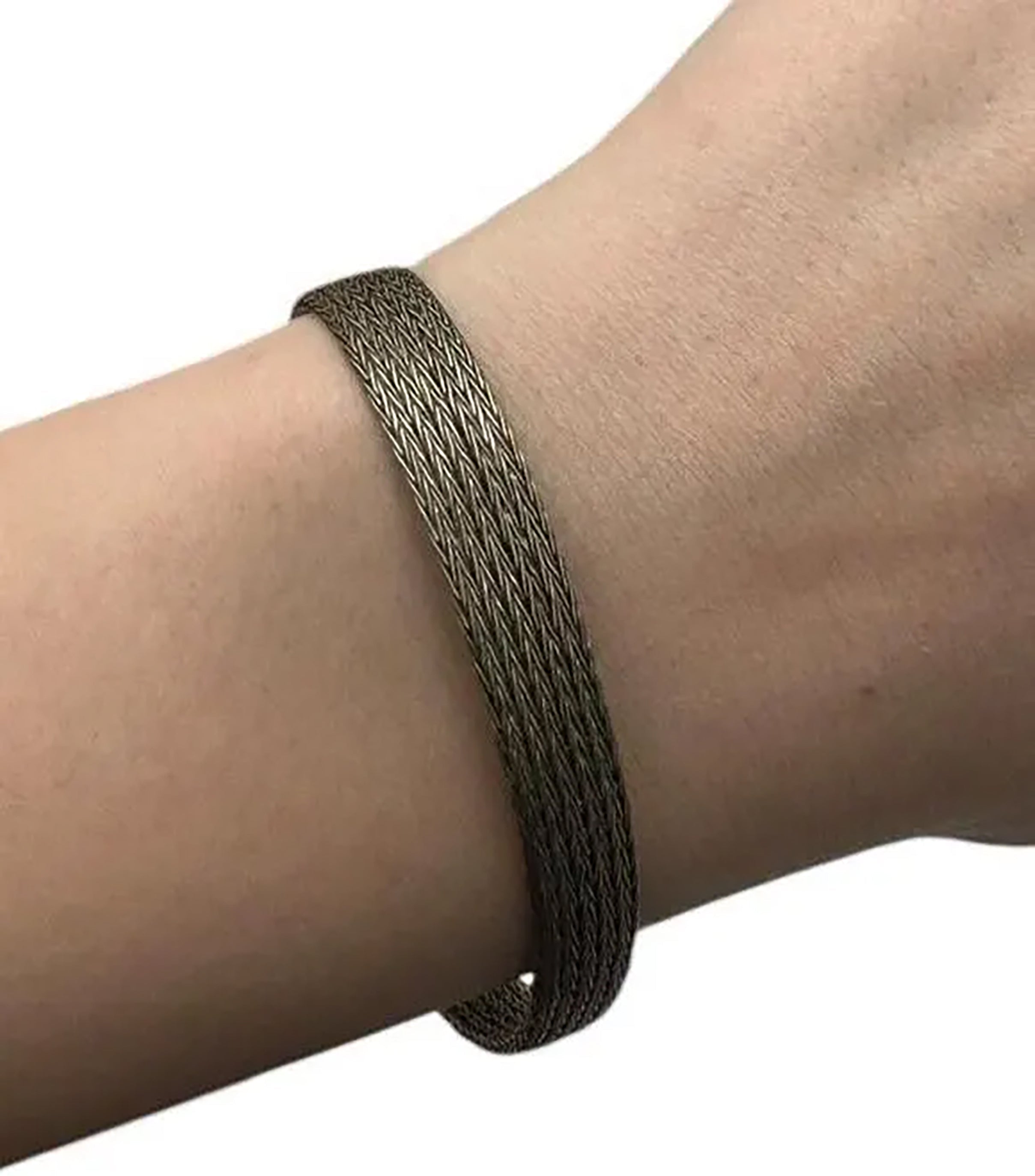 Sterling Silver Flexible Link Bracelet With Flower Details