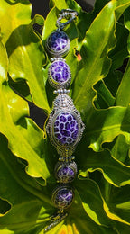Beautiful SARDA sterling silver link bracelet featuring five oval purple cabocho