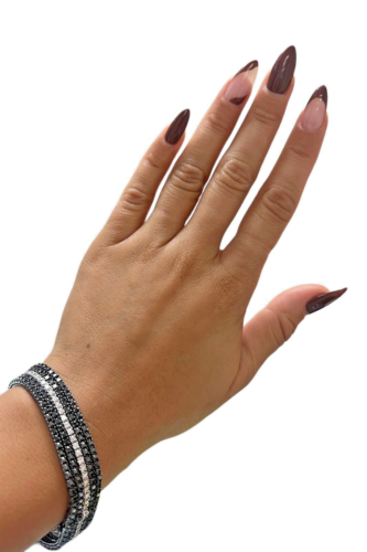 18kt Black Power Bracelet with approx. 10.00ctw Black and White Diamonds